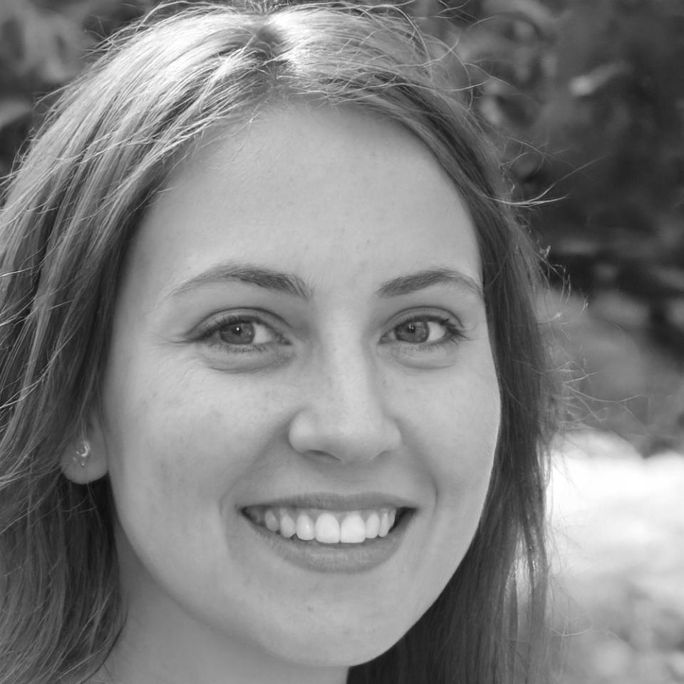 Professional wedding planner portrait showing expertise and approachable personality